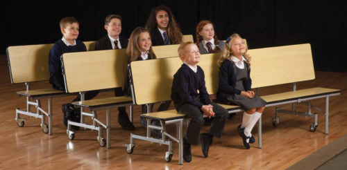 Children sitting at Spaceright Convertible Bench Unit