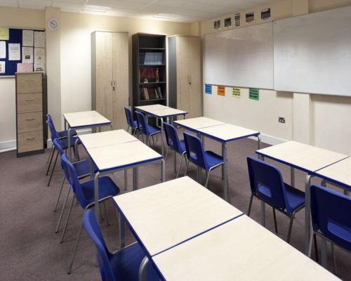 Classroom with Blue Hille GH20 Chairs and rectangular tables