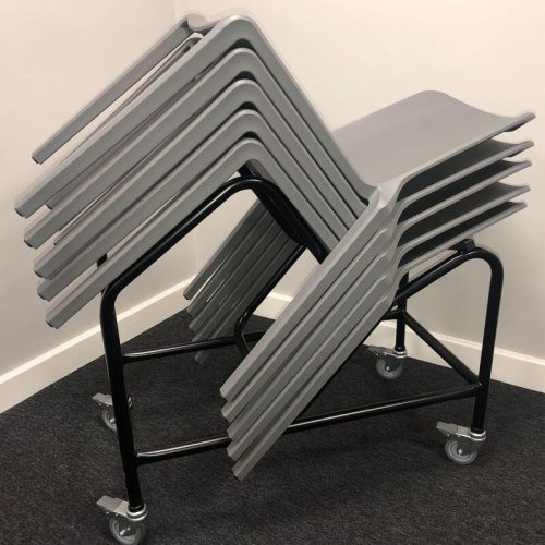 5 stacked Grey KI Hatton Chairs on trolley