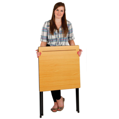 Woman holding a folded school exam desk