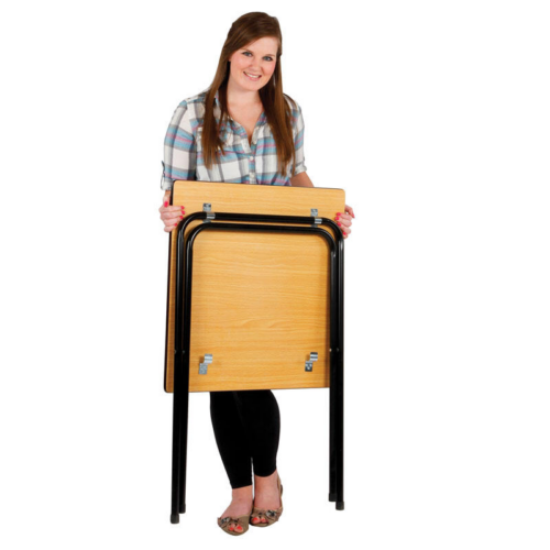 Woman holding a folded school exam desk