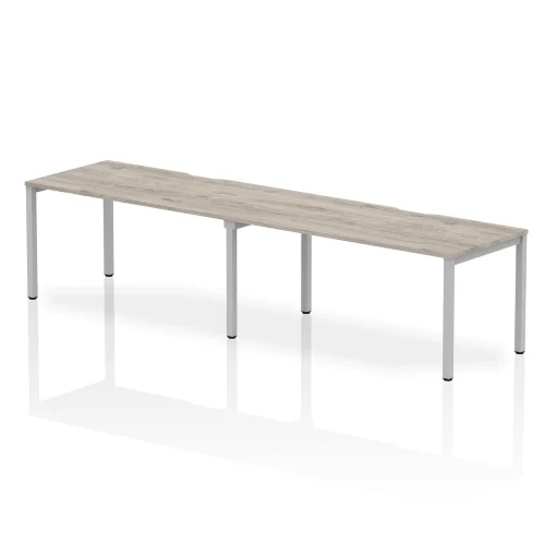 Evolve Plus 2 Person Single Row Office Bench Desk Grey Oak Top Silver Frame