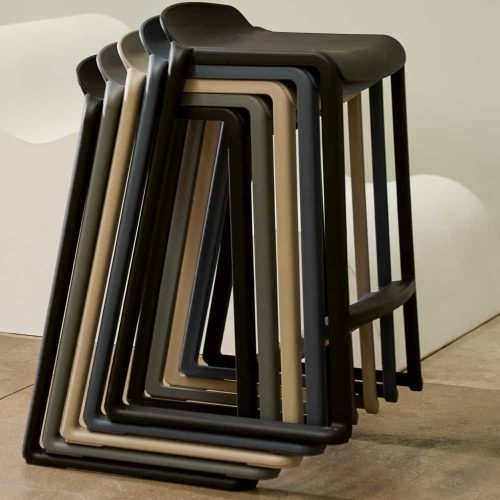 Stack of Postura One Piece Stools